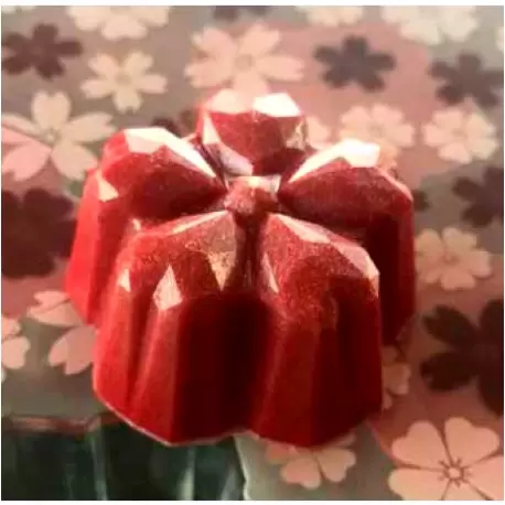 Polycarbonate Sakura Origami by Kohei Ogata Chocolate Mold - 31 x 30 x 15 mm - 9.5gr - 3x7 Cavity - 275x135x24mm Polycarbonate Sakura Origami by Kohei Ogata Chocolate Mold - 31 x 30 x 15 mm - 9.5gr - 3x7 Cavity - 275x135x24mm