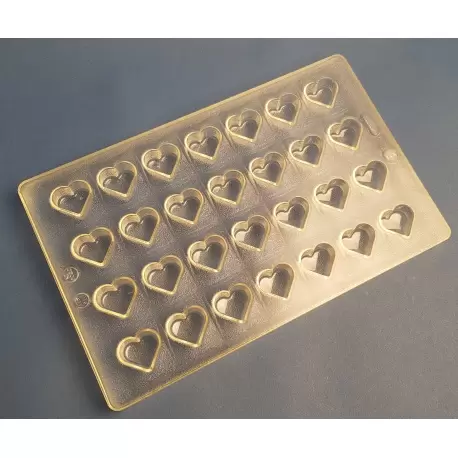 Hans Brunner HB-9060-PC Thermoformed Polycarbonate Chocolate Straight Heart Mold - Heart praline - 25 x 22 x 16 mm - 7.5 grs ... Hans Brunner HB-9060-PC Thermoformed Polycarbonate Chocolate Straight Heart Mold - Heart praline - 25 x 22 x 16 mm - 7.5 grs ...