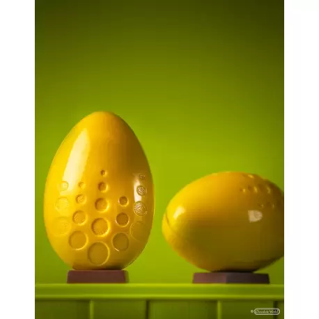 Chocolate World CW12108 Polycarbonate Chocolate Egg Mold with Textured Round Circles - 70mm x 47mm x h 22mm - 8 cavity - 45gr... Chocolate World CW12108 Polycarbonate Chocolate Egg Mold with Textured Round Circles - 70mm x 47mm x h 22mm - 8 cavity - 45gr...