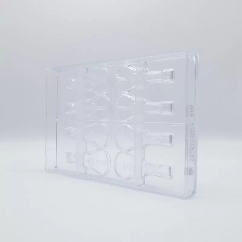 Polycarbonate Guitar Chocolate Mold - 95mm x 35mm x h 6mm - 13gr - 8 cavity Polycarbonate Guitar Chocolate Mold - 95mm x 35mm x h 6mm - 13gr - 8 cavity