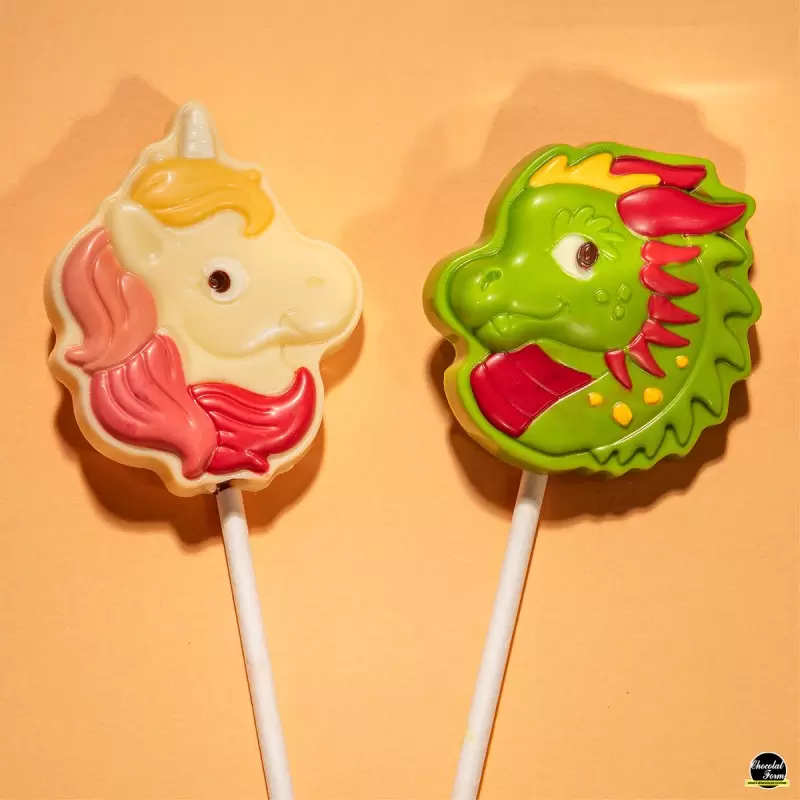 Polycarbonate Dragon Lollipop Chocolate Mold - 55mm x 50mm x h 12mm - 20gr - 5 cavity Polycarbonate Dragon Lollipop Chocolate Mold - 55mm x 50mm x h 12mm - 20gr - 5 cavity